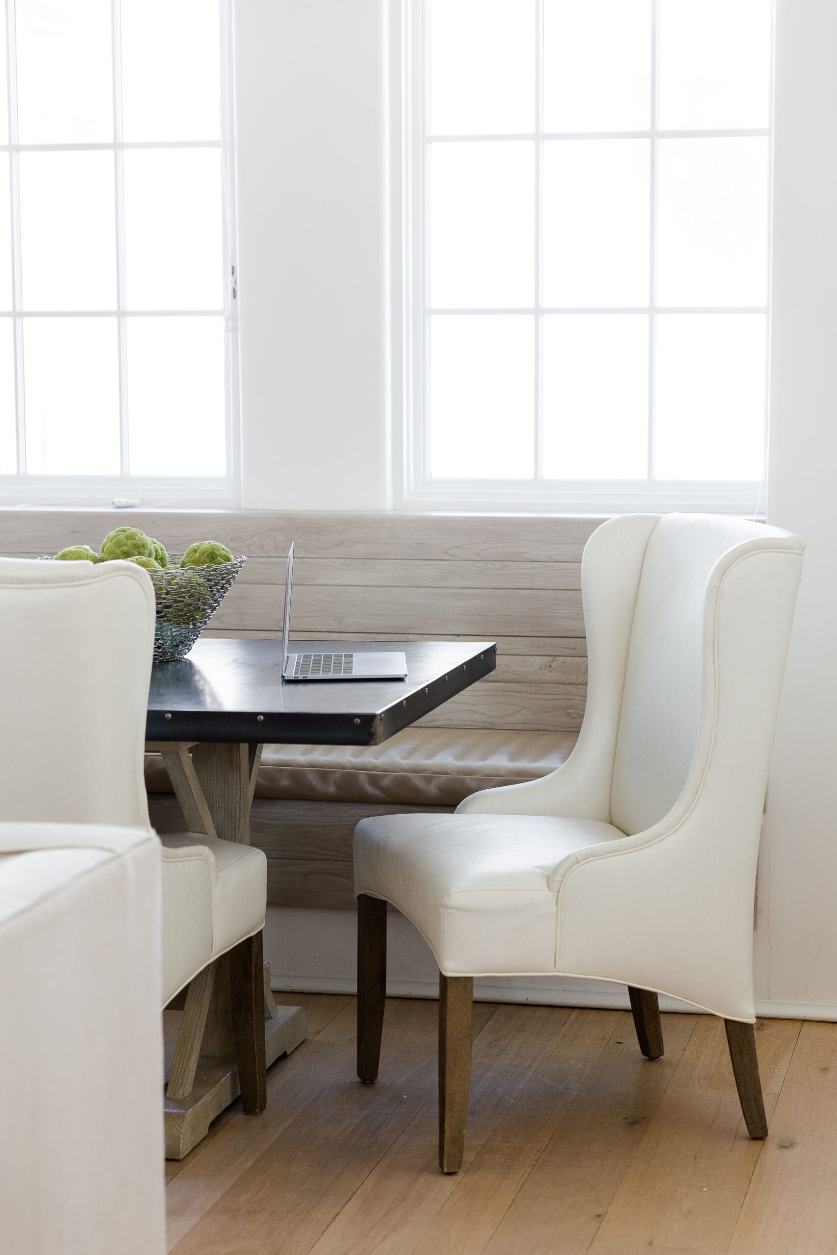 Quiet dining room scene for a virtual assistant to work in for photographers.